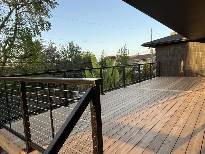 Wood deck with horizontal cable railings