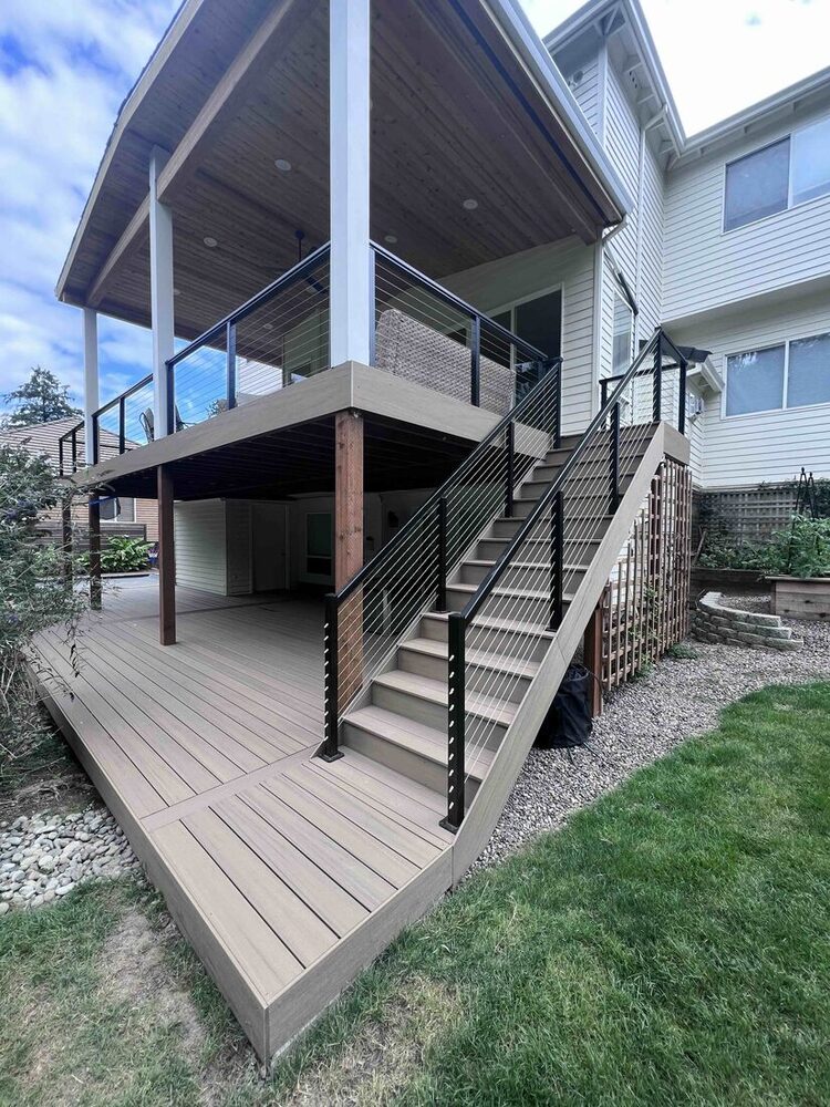 Custom exterior deck stairs with aluminum cable railing and composite decking