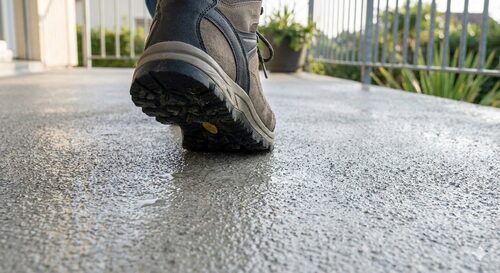 Slip-resistant waterproof deck coating with textured finish